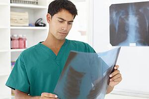 Young male doctor with x-ray