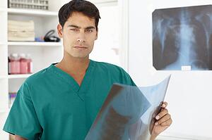 Young male doctor with x-ray