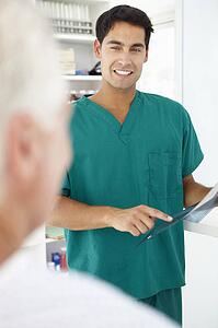 Young doctor with senior patient
