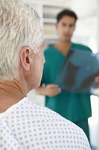 Young doctor with senior patient