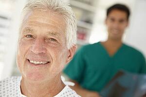Young doctor with senior patient