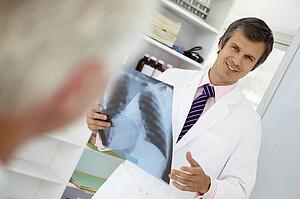 Young doctor with senior patient