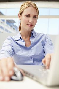Businesswoman using laptop