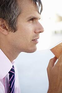 Businessman drinking coffee
