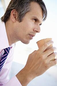 Businessman drinking coffee