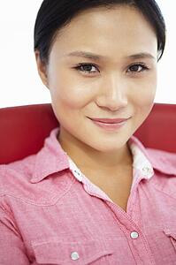 Young woman sitting in chair