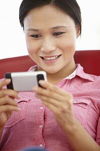 Young woman texting