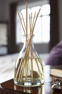 Incense sticks on bedside table