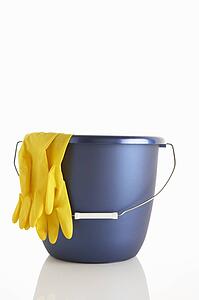 Bucket and rubber gloves