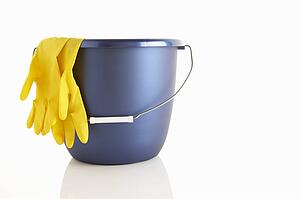 Bucket and rubber gloves