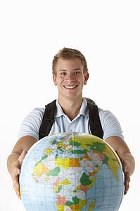 Young traveller with globe