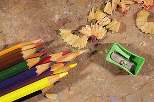 Coloured Pencils, Pencil Sharpener And Pencil Shavings