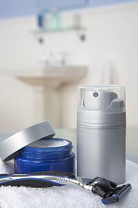 Man's shaving kit in bathroom