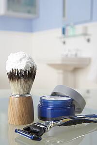 Man's shaving kit in bathroom