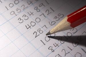 Handwritten numbers in ledger