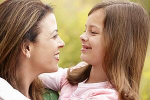 Portrait Hispanic mother and daughter