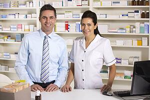 UK nurse and pharmacist working in pharmacy