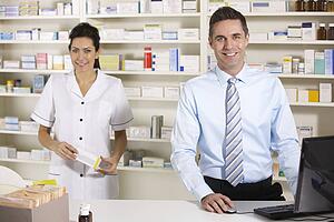 UK nurse and pharmacist working in pharmacy