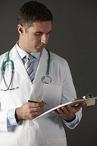 American doctor with clipboard and stethoscope