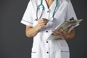 American nurse with stethoscope and clipboard