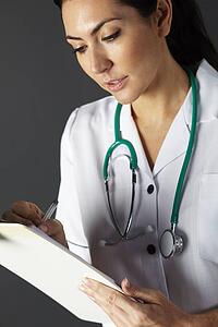 American nurse with stethoscope and clipboard