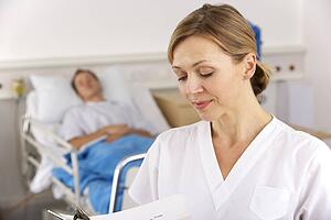American nurse working on hospital ward