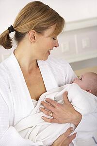 Mother in hospital with newborn baby