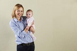 Studio Shot Of Happy Mother and Baby