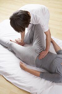 Woman having Shiatsu massage