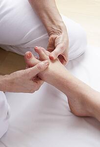 Detail foot reflexology massage