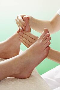 Detail woman having foot massage