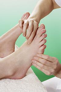 Detail woman having foot massage