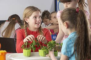 Children learning about plants in school class