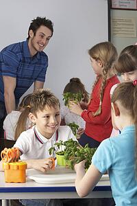 Children learning about plants in school class