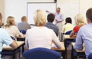 Senior tutor teaching class