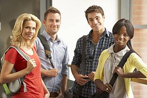 Mixed group of students in college