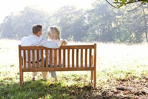 Senior couple sitting outdoors