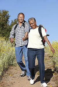Senior couple on country hike