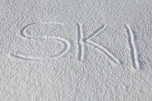 Word Ski Drawn In Fresh Snow