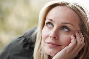 Outdoor Portrait Of Woman Wearing Winter Clothes