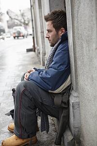 Homeless Young Man Begging In Street