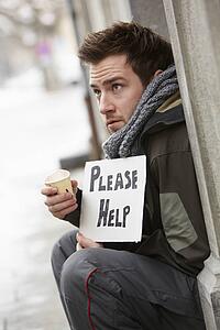 Homeless Young Man Begging In Street