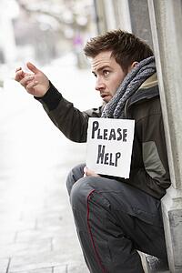Homeless Young Man Begging In Street