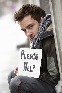 Homeless Young Man Begging In Street